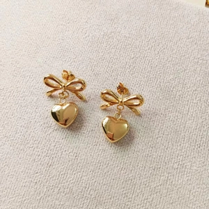Elegant 18K gold-plated stainless steel bow and heart pendant earrings for women