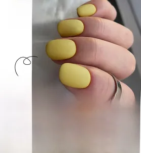 Matte lemon yellow press-on nails with a square shape and elegant frosted finish