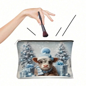 Detail of high-capacity highland cow makeup bag with festive winter illustration