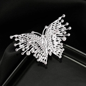 Vintage style butterfly brooch with silver rhinestones and hollow wing design for women