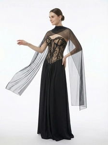 Elegant black lace corset evening gown with a sheer tulle shawl in a full-length pose