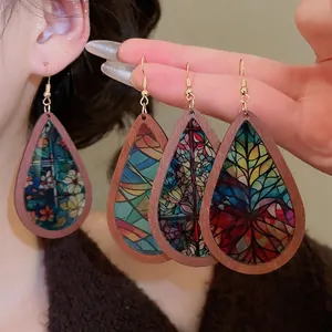 Ethnic teardrop earrings with wood frame and colorful retro floral pattern art