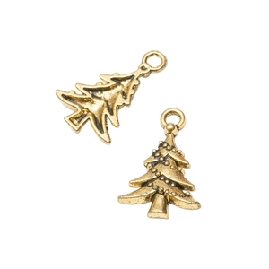 Macro detail of antique gold Christmas tree pendants with intricate embossed textures