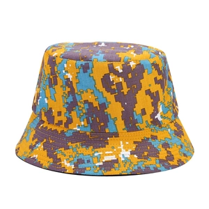 Reversible double-sided digital camouflage bucket hat in yellow and blue pixel pattern