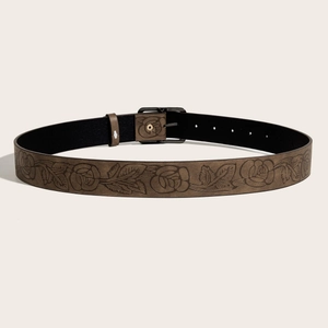 Brown textured leather belt with rose embossing and black metal buckle on white background
