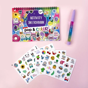 Kids coloring book set with spiral-bound album, glitter pen and stickers on pink background