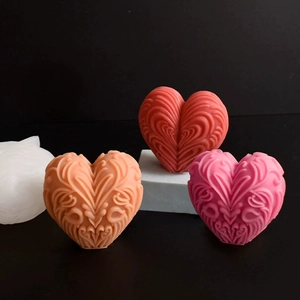 Relief striped heart candle silicone mold with three finished handmade texture wax candles