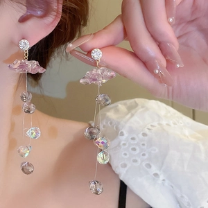 Elegant long tassel earrings with purple flower petals and clear crystal bead accents