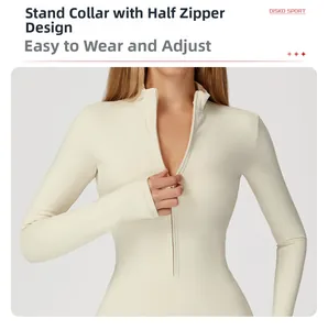 Detail of slim fit thermal yoga bodysuit with stand collar and half-zipper design