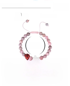 Detail showing 8mm pink zebra stone beads and adjustable basketball charm bracelet