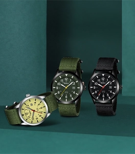 Detailed trio of military quartz watches with nylon straps and multi-colored dials