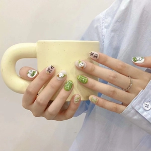 Handmade Dragon Boat Festival press-on nails featuring cute green zongzi leaf patterns
