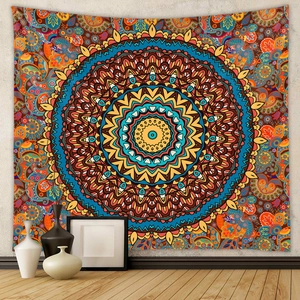 Bohemian mandala tapestry with colorful paisley patterns on a white textured wall