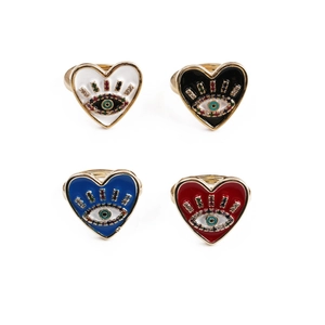 Close-up of heart evil eye rings in four enamel colors with gold plating and zircon