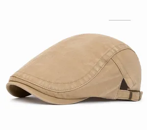 Detail view of khaki washed cotton flat cap with retro adjustable metal buckle side