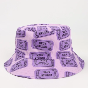 Detailed close-up of pink bucket hat with NECY STUDIO bill print on cotton canvas