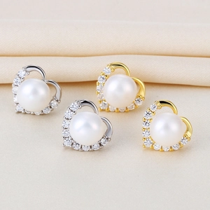 Elegant heart-shaped S925 silver pearl stud earrings with sparkling cubic zirconia accents