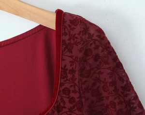 Detail of square neckline with wine red velvet trim and vintage floral flocked mesh sleeve