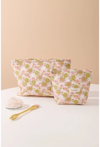 Floral makeup bag set with white mesh overlay and flower zipper pull detail