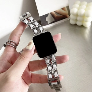 Detail of silver metal chain interwoven with white leather strap for Apple Watch