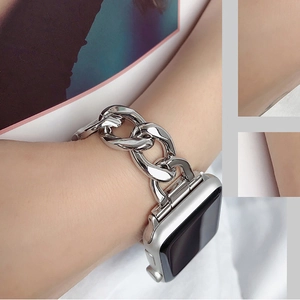 Detail view of silver chain metal strap on wrist for Apple Watch and iWatch