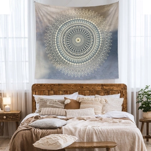 Bohemian mandala tapestry with golden totem in warm bedroom wall decor setup