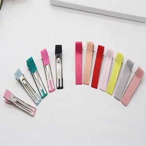 Set of colorful fabric-wrapped alligator hair clips in various candy-colored striped ribbons