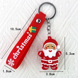 Detail view of 3D Santa keychain with dimension measurements and festive red wristband