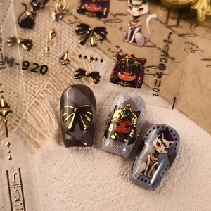Egyptian cat theme nail stickers in black and gold with M-920 hieroglyphic designs