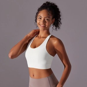 Détail du soutien-gorge de sport blanc dos nageur sans couture en tissu respirant élastique