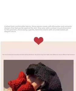 Close-up of red and black knitted headbands showing soft woolen fabric and skin-friendly texture