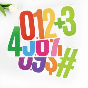 Detailed view of colorful 6-inch waterproof number and symbol stickers for outdoor use