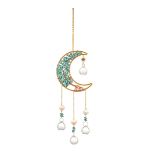 Detailed view of moon sun catcher with turquoise stones and crystal prisms hanging on a chain