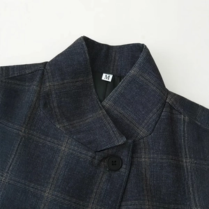 Women's stylish blue plaid blazer with a stand-up collar and black button detail
