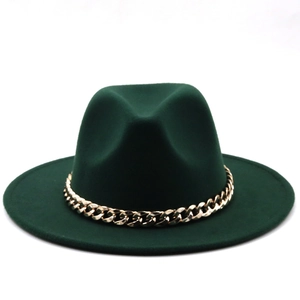 Detailed close-up of dark green felt fedora hat featuring a stylish gold chain band
