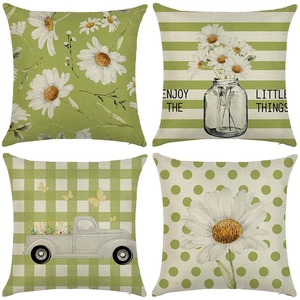 Set of four floral linen cushion covers with daisies and Enjoy The Little Things text