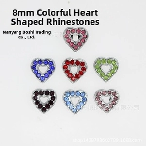 Close-up of 8mm heart-shaped charm connectors with multi-color crystal rhinestones