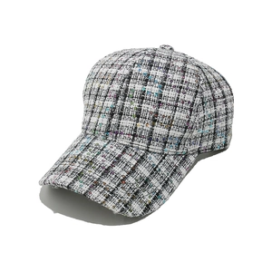 Classic tweed baseball cap with colorful sequins and textured pattern on white background