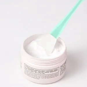 Silicone face mask brush set with soft flat applicator and white skin care cream jar