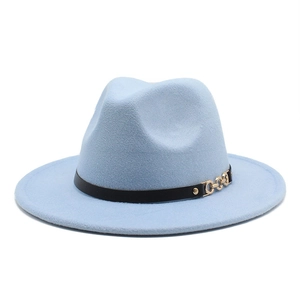 Macro detail of a light blue wide brim fedora hat with black belt and gold chain decoration