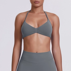 Detailed view of the seamless ribbed fabric and V-neck halter sports bra construction
