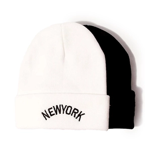 Winter knit beanies in black and white with NEW YORK embroidery for men and women