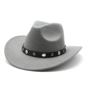 Detailed macro view of light gray felt cowboy hat with studded black leather band