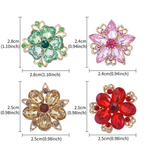 Detailed view of daisy brooches in four colors with crystal inlays and size measurements