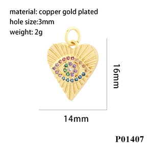 Macro detail of gold plated heart pendant with zircon eye and technical dimensions