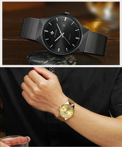 Detailed views of men's quartz watch with mesh band in black and gold color finishes