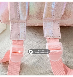 Detail of pink laser surface backpack featuring adjustable strap with translucent buckle