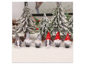 Detailed view of six Christmas gnomes with knitted hats on white snow background