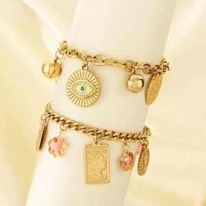 Vintage gold layered bracelet set with coin pendants and pink crystal flower charms