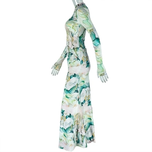 Detail of slim fit two-piece set featuring green marble abstract print and pleated texture